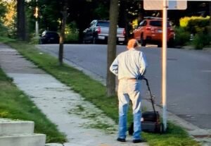 Denim Man Mows the Streets